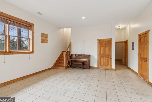 435 Ranch Mountan Dr, Dahlonega, GA 30533 - unfurnished room featuring baseboards, stairway, and light tile patterned floors