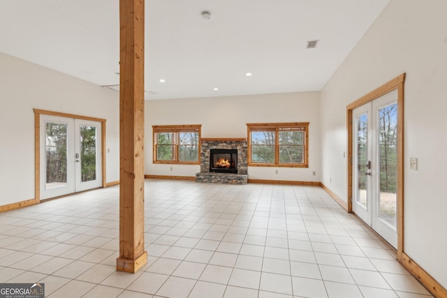 435 Ranch Mountan Dr, Dahlonega, GA 30533 - unfurnished living room with french doors, baseboards, a fireplace, recessed lighting, and light tile patterned floors