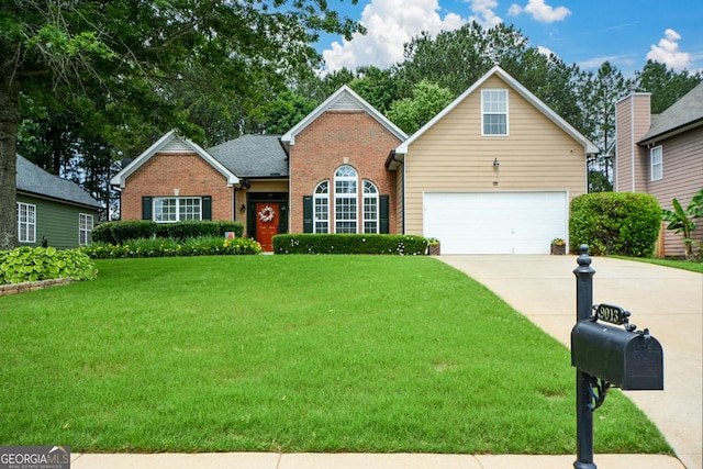 9013 Aldbury Dr, Locust Grove, GA 30248 - traditional-style house featuring driveway, brick siding, a front yard, and a garage
