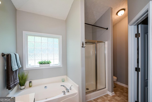 9013 Aldbury Dr, Locust Grove, GA 30248 - full bath featuring a bath, a shower stall, toilet, and baseboards