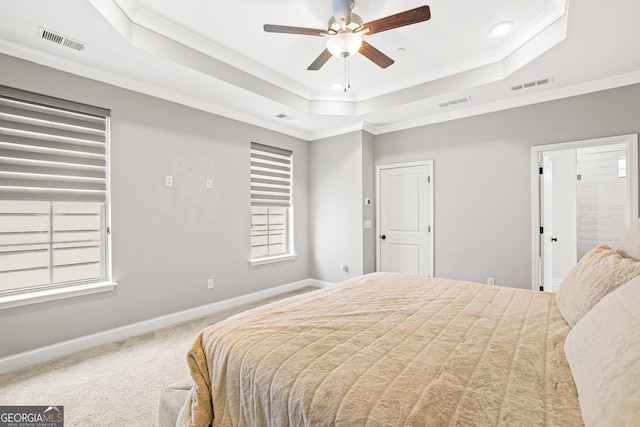 1058 Kirkland Cir, Smyrna, GA 30080 - carpeted bedroom featuring a tray ceiling, crown molding, baseboards, recessed lighting, and ceiling fan