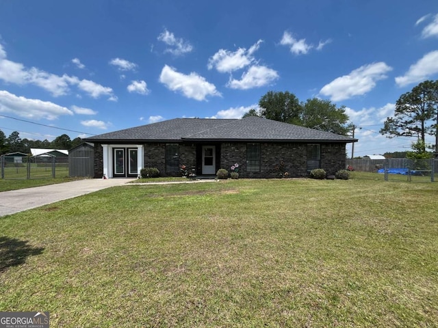 43 Fabian Ln, Hinesville, GA 31313 - view of front of house featuring concrete driveway and a shingled roof