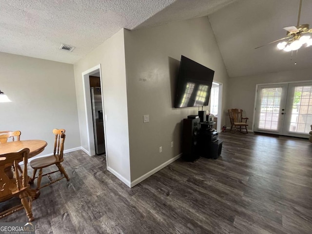 43 Fabian Ln, Hinesville, GA 31313 - dining area with dark wood finished floors, a ceiling fan, baseboards, a textured ceiling, and vaulted ceiling