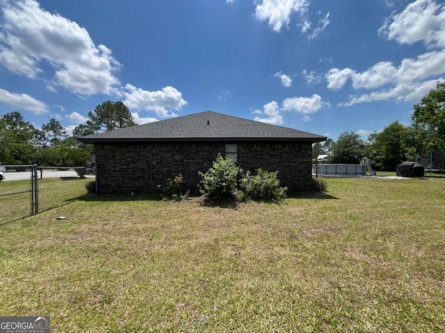 43 Fabian Ln, Hinesville, GA 31313 - view of home's exterior with brick siding