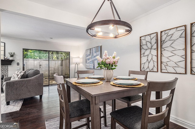 6172 Brookwood Rd, Peachtree Corners, GA 30092 - dining area with ornamental molding, dark wood-type flooring, and a chandelier
