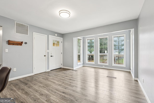 6072 Holiday Blvd, Forest Park, GA 30297 - entrance foyer featuring wood finished floors and baseboards