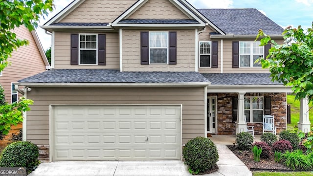 18 Crown Dr, Dallas, GA 30132 - craftsman-style house featuring a porch, an attached garage, a shingled roof, and driveway