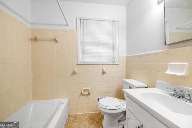 136 Briarwood Dr, Toccoa, GA 30577 - full bath featuring tile walls, toilet, vanity, wainscoting, and tile patterned floors