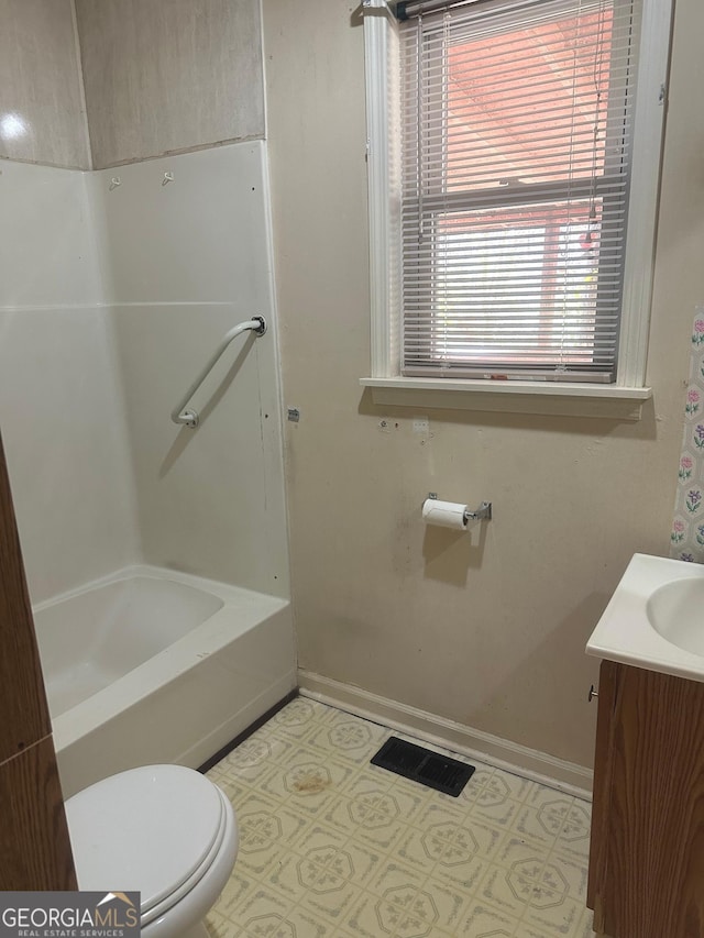 421 Chase Cir, Cornelia, GA 30531 - full bathroom with toilet, vanity, baseboards, shower / washtub combination, and tile patterned floors