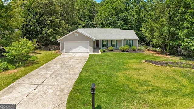 333 Ivy Hills Cir, Mount Airy, GA 30563 - view of front of house with driveway, a front yard, and an attached garage