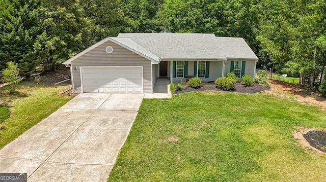 333 Ivy Hills Cir, Mount Airy, GA 30563 - ranch-style house with concrete driveway, a garage, a front yard, and a porch