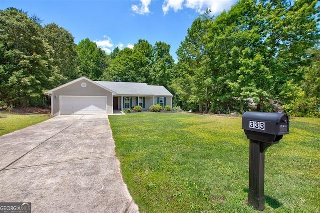 333 Ivy Hills Cir, Mount Airy, GA 30563 - single story home with driveway, a front lawn, and a garage