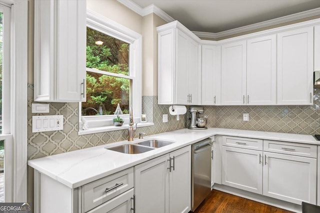 161 Highgrove Dr, Suwanee, GA 30024 - kitchen with a sink, stainless steel dishwasher, white cabinets, dark wood-type flooring, and crown molding