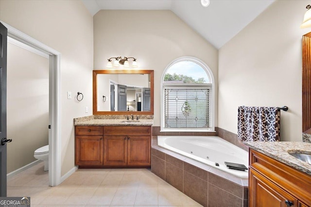 161 Highgrove Dr, Suwanee, GA 30024 - full bath featuring vanity, a jetted tub, toilet, vaulted ceiling, and tile patterned flooring