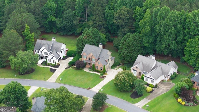 161 Highgrove Dr, Suwanee, GA 30024 - aerial view of property's location with a forest and nearby suburban area