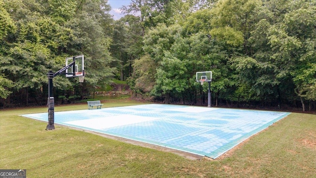 161 Highgrove Dr, Suwanee, GA 30024 - view of basketball court featuring a lawn, basketball hoop, and a wooded view