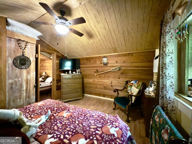 87 Garden Ln, Cleveland, GA 30528 - bedroom with wood ceiling, lofted ceiling, light wood-style floors, and wooden walls