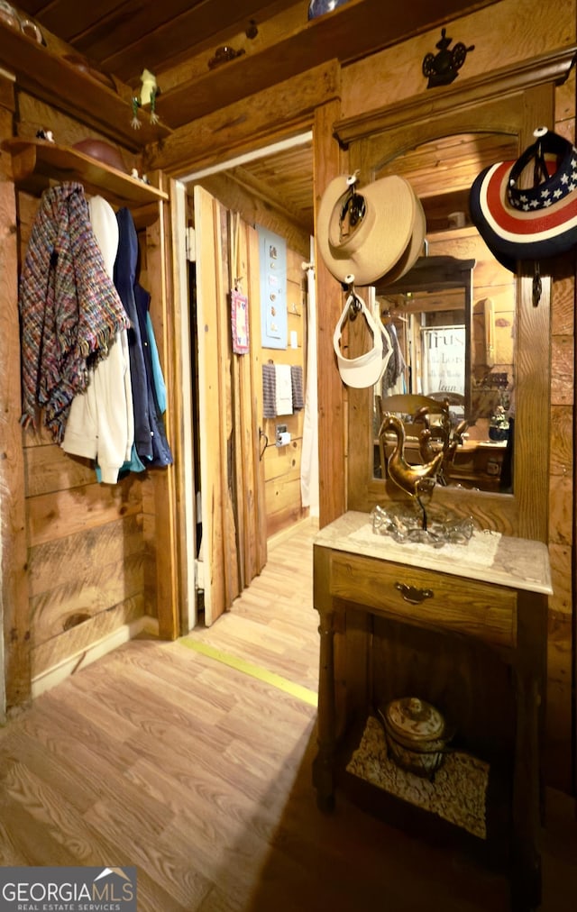 87 Garden Ln, Cleveland, GA 30528 - corridor with wooden walls and wood finished floors