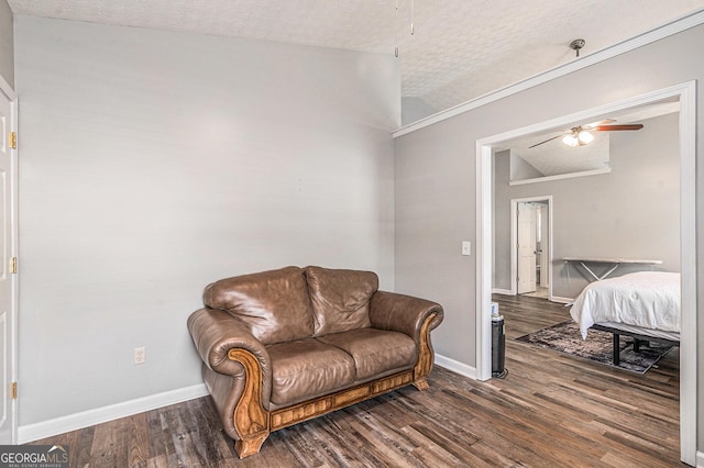 1108 The By Way, Mcdonough, GA 30252 - living area with ceiling fan, wood finished floors, baseboards, and a textured ceiling