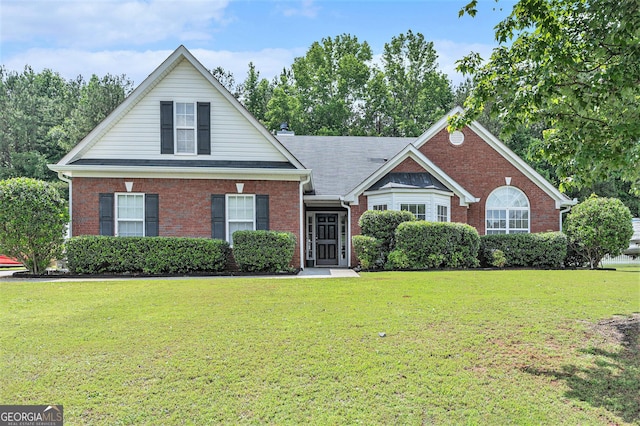 1108 The By Way, Mcdonough, GA 30252 - view of front facade featuring a front lawn and brick siding