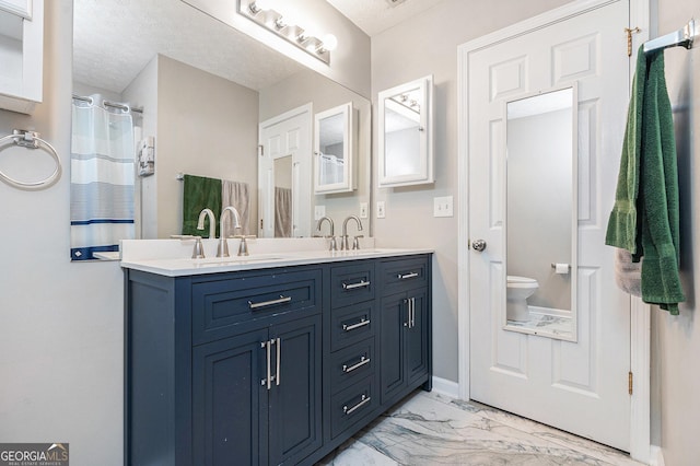 1108 The By Way, Mcdonough, GA 30252 - full bath featuring marble finish flooring, double vanity, toilet, and a textured ceiling