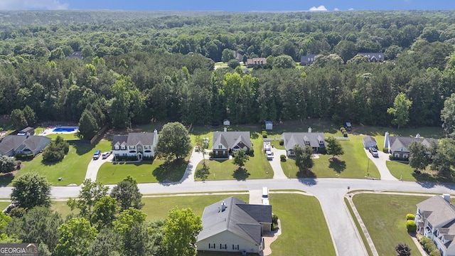 1108 The By Way, Mcdonough, GA 30252 - aerial perspective of suburban area featuring a heavily wooded area