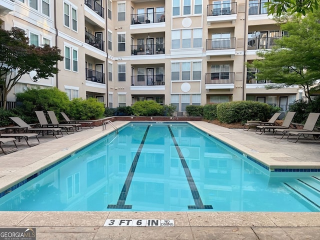 1850 Cotillion Dr Unit 2416, Atlanta, GA 30338 - community pool with a patio