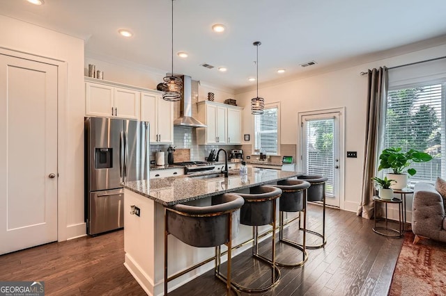 2543 Oakbourne Ln Unit 14, Smyrna, GA 30080 - kitchen featuring stainless steel fridge, wall chimney range hood, a sink, dark wood-style flooring, and recessed lighting
