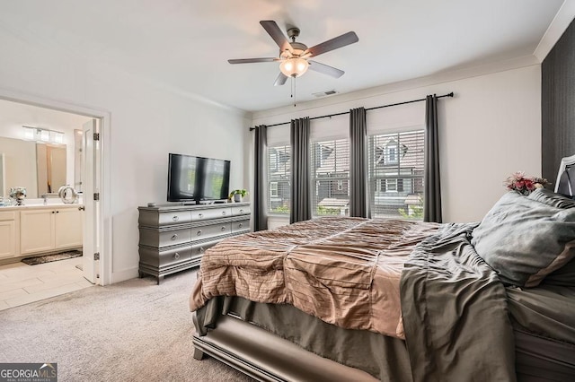 2543 Oakbourne Ln Unit 14, Smyrna, GA 30080 - bedroom featuring ensuite bath, light colored carpet, and a ceiling fan
