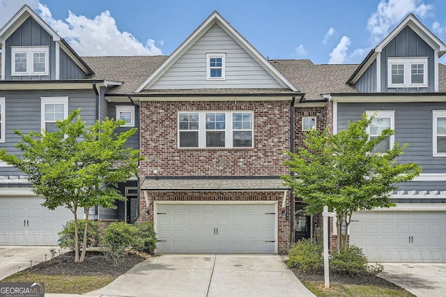 2543 Oakbourne Ln Unit 14, Smyrna, GA 30080 - multi unit property featuring board and batten siding, brick siding, driveway, and a shingled roof