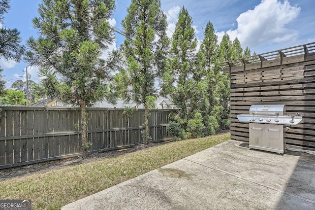 2543 Oakbourne Ln Unit 14, Smyrna, GA 30080 - fenced backyard featuring a patio area