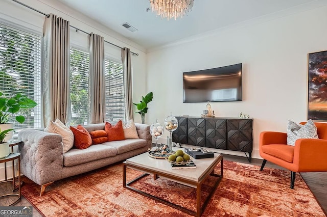 2543 Oakbourne Ln Unit 14, Smyrna, GA 30080 - living room with wood finished floors, a chandelier, ornamental molding, and baseboards