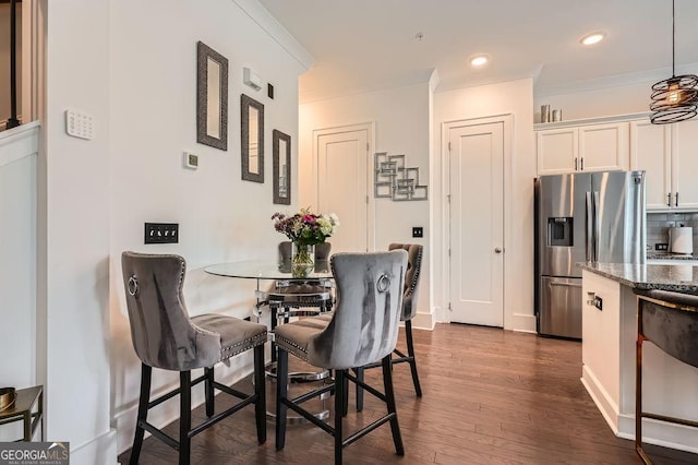 2543 Oakbourne Ln Unit 14, Smyrna, GA 30080 - dining area featuring ornamental molding, dark wood-type flooring, and recessed lighting