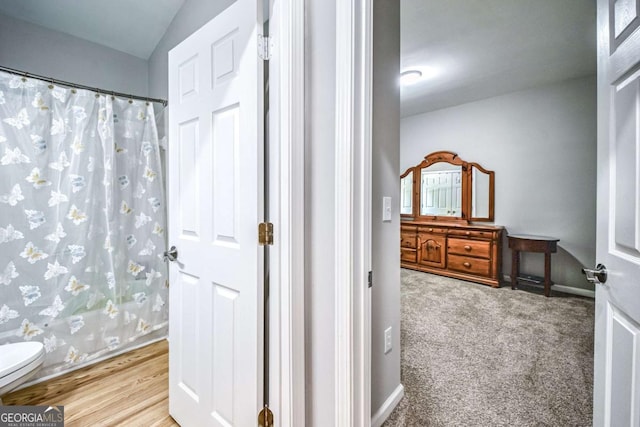 1325 Starboard Way, Cumming, GA 30041 - bathroom with toilet, curtained shower, vanity, and baseboards