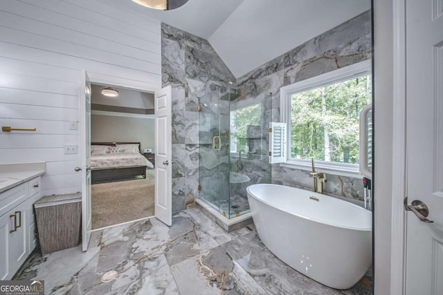 1325 Starboard Way, Cumming, GA 30041 - full bathroom featuring vaulted ceiling, a marble finish shower, a freestanding bath, connected bathroom, and vanity