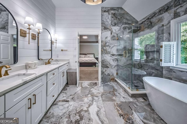 1325 Starboard Way, Cumming, GA 30041 - ensuite bathroom featuring marble tiled floors, a soaking tub, double vanity, a marble finish shower, and vaulted ceiling