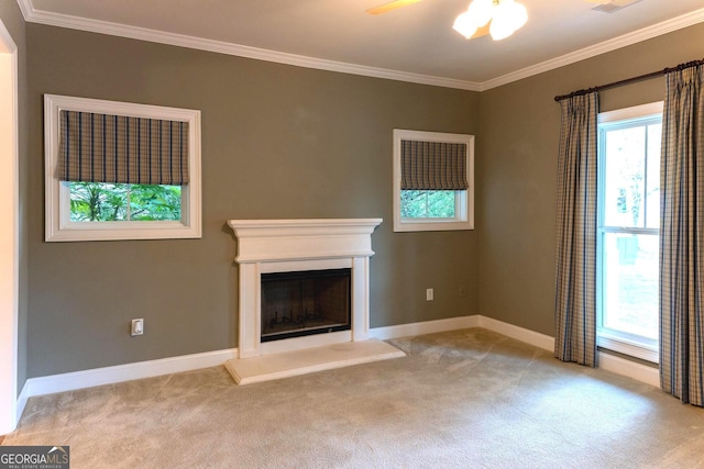 515 Edgewood Dr, Athens, GA 30606 - unfurnished living room featuring light carpet, ornamental molding, ceiling fan, baseboards, and a fireplace with raised hearth