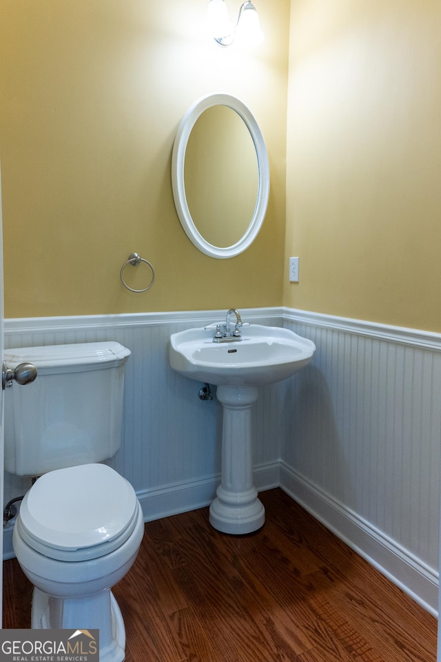 515 Edgewood Dr, Athens, GA 30606 - half bath with wainscoting, wood finished floors, and toilet