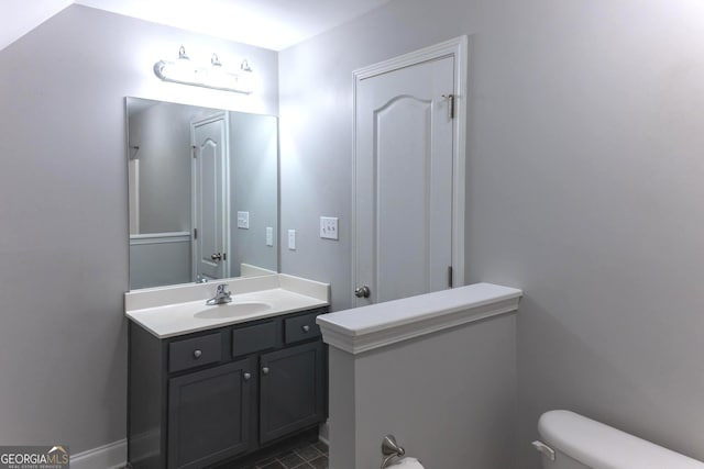 515 Edgewood Dr, Athens, GA 30606 - bathroom with toilet, vanity, and tile patterned floors