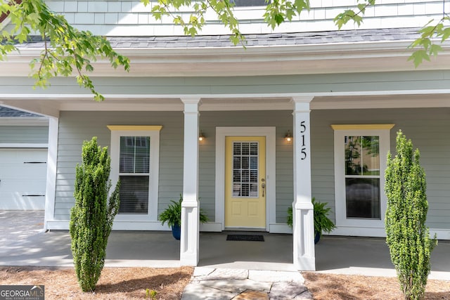 515 Edgewood Dr, Athens, GA 30606 - entrance to property with covered porch, a shingled roof, and a garage