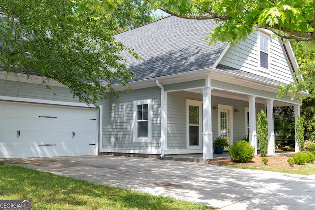 515 Edgewood Dr, Athens, GA 30606 - view of front of home featuring roof with shingles, a porch, a garage, and driveway
