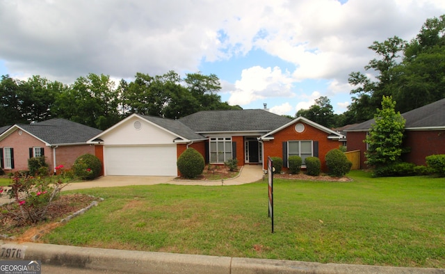 7976 Big Creek Pl, Columbus, GA 31904 - ranch-style home with an attached garage, brick siding, a front lawn, and driveway