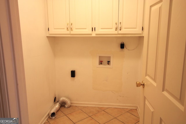 7976 Big Creek Pl, Columbus, GA 31904 - laundry room featuring baseboards, electric dryer hookup, cabinet space, light tile patterned floors, and hookup for a washing machine