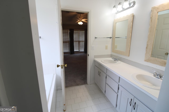 7976 Big Creek Pl, Columbus, GA 31904 - full bath featuring double vanity, ceiling fan, a tub, and tile patterned flooring