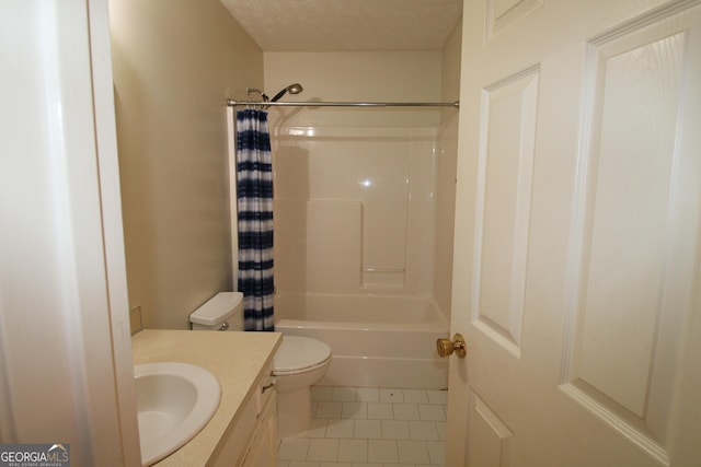 7976 Big Creek Pl, Columbus, GA 31904 - bathroom featuring vanity, tile patterned flooring, a textured ceiling, and shower / tub combo with curtain