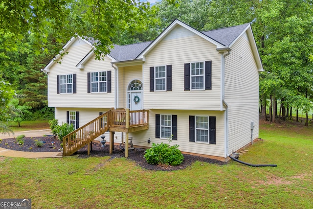 131 Glenn Fuller Cir, Commerce, GA 30529 - bi-level home featuring a front yard and view of scattered trees