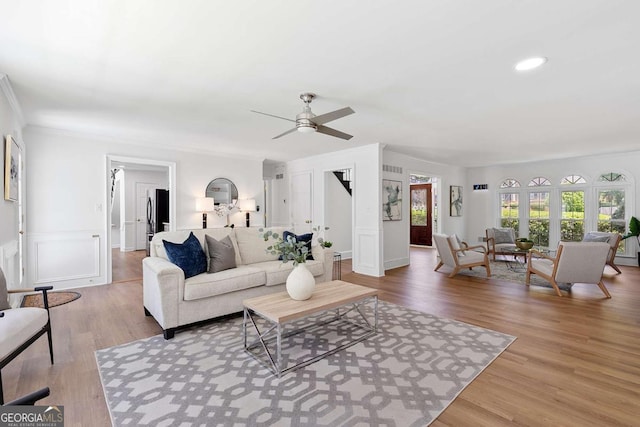 5706 Brookstone Walk NW, Acworth, GA 30101 - living room with a ceiling fan, crown molding, light wood-type flooring, and recessed lighting