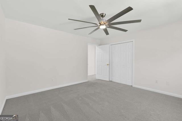 5706 Brookstone Walk NW, Acworth, GA 30101 - unfurnished bedroom with carpet floors, ceiling fan, and a closet