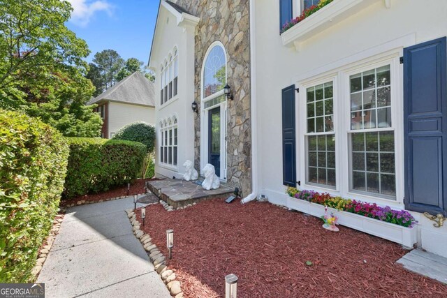 5706 Brookstone Walk NW, Acworth, GA 30101 - view of exterior entry with stone siding and stucco siding