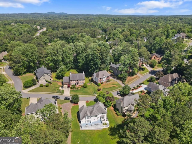 5706 Brookstone Walk NW, Acworth, GA 30101 - aerial view of property and surrounding area featuring a forest and nearby suburban area